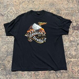 Miller tee used in good condition . Fits XL/L worn a handful